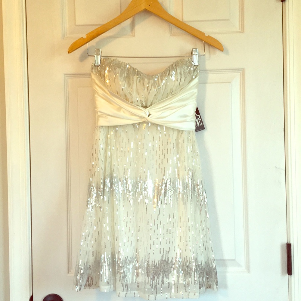 Sparkly little strapless dress.